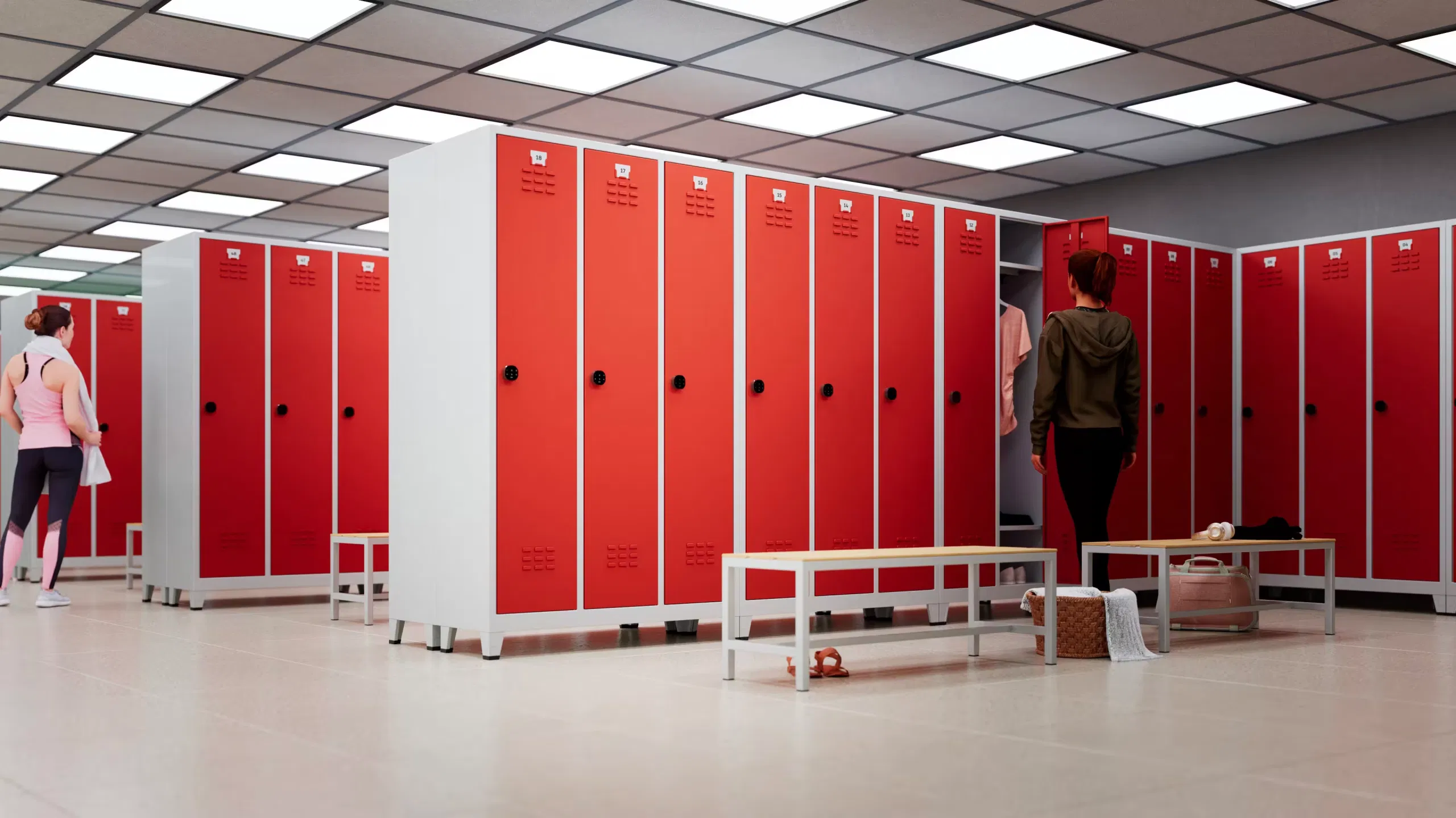 Locker room benches beside metal lockers in a changing room